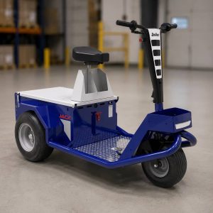 Le triporteur Jack bleu dans un atelier